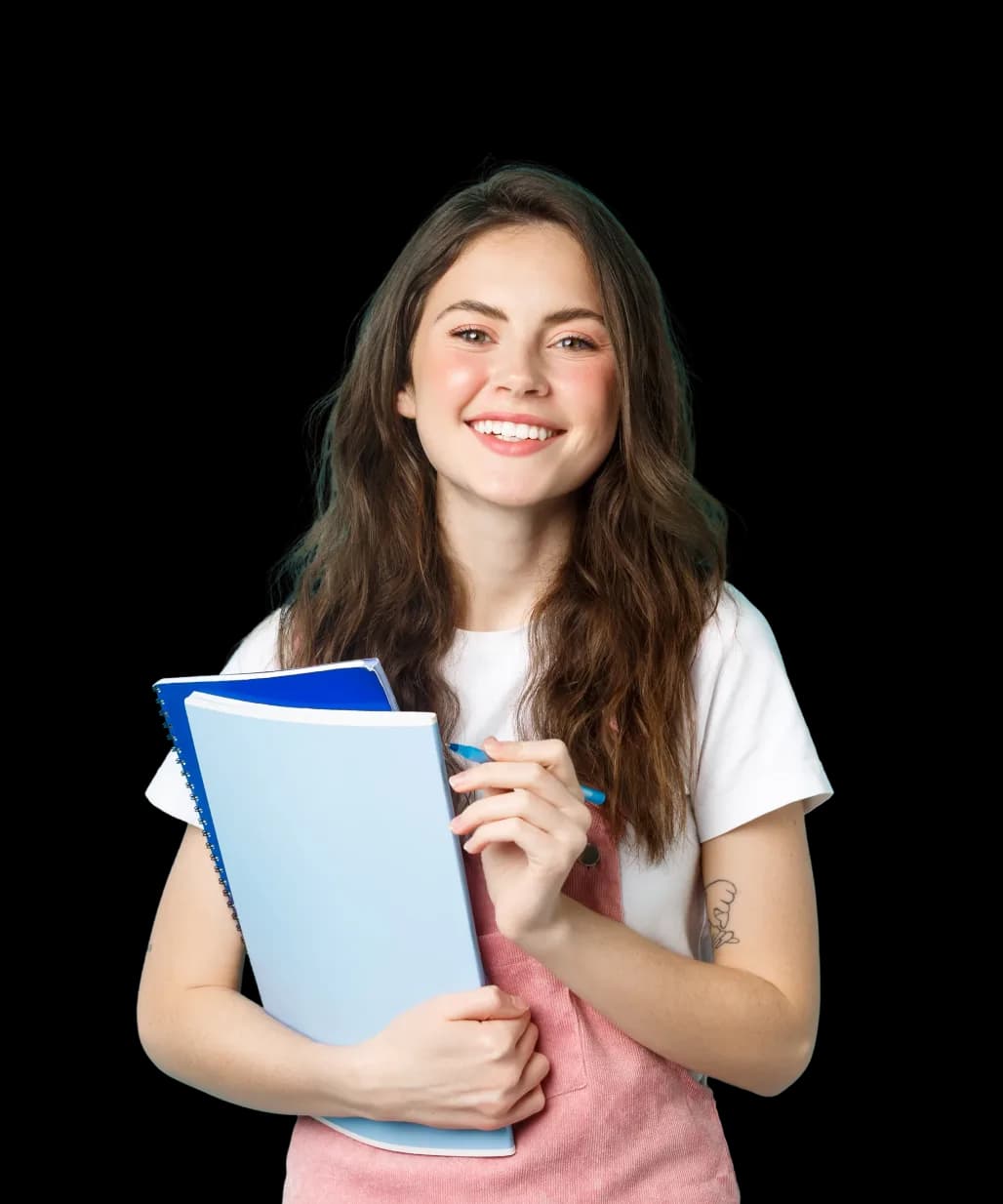 Student holding notebooks